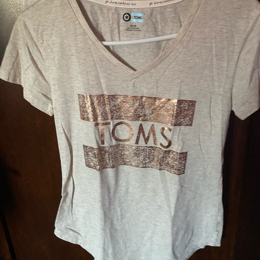 Toms brand shirt from target. Never worn.